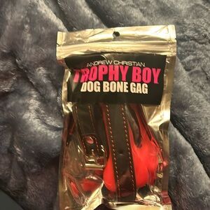 Andrew Christian trophy, boy, dog bone gag adult toy